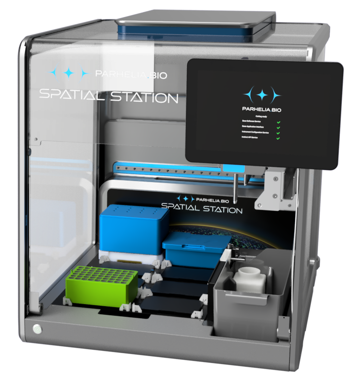 The Parhelia Spatial Station benchtop instrument, open, showing its deck, reagent racks and touchscreen